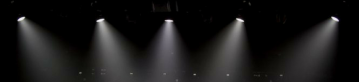 Black banner with spotlights