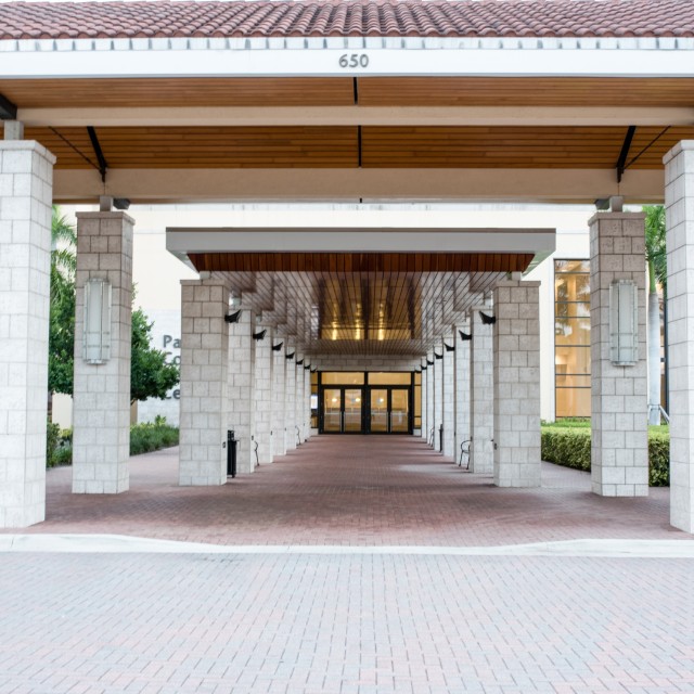 Exterior photo of the Porte Cochere walkway from the drive-up to the front door entrance