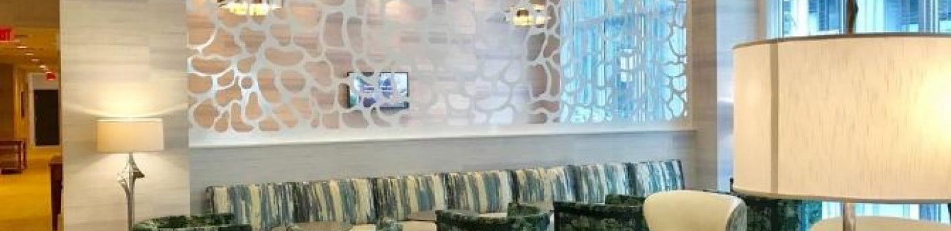 Hyatt Place, which opened in 2009, has a brighter look of the lobby bar meant to attract pedestrians, as well, General Manager Ben Walters said. [Tony Doris/ palmbeachpost.com] Photograph 