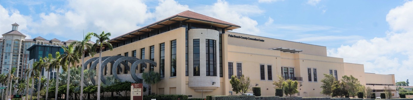 Exterior west side of convention center building with large window overlooking Okeechobee Blvd.