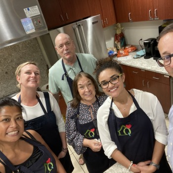 Photo of our staff making meals at Quantum House.