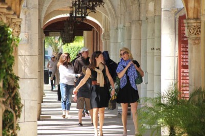 Photo of worth avenue with several shoppers walking on the street