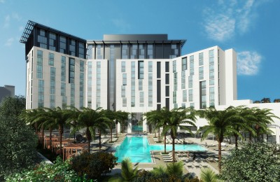 Photo of the Hilton West Palm Beach Pool view and hotel in the background