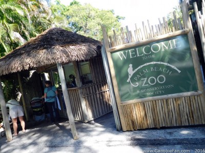 Photo of the ticket hut at zoo entry with a family purchasing tickets