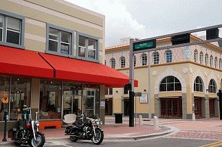 Photo of the Clematis Street with motorcycles and red awning.