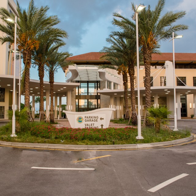 Photo of the corner of the parking garage from an aerial drone view looking down the corner onto the circle drive at the southeast entrance.