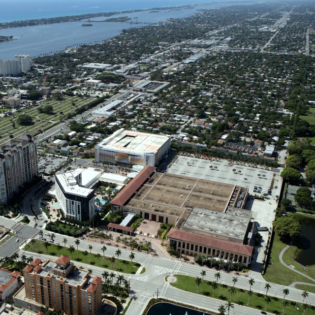 Aerial Photo view of the entire convention center facility including the Hilton hotel, parking garage, parking lot, and Okeechobee boulevard.